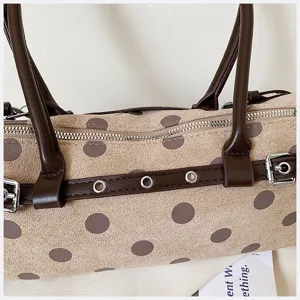 Stylish Korean style polka dot underarm bag for women, chic suede shoulder baguette bag.