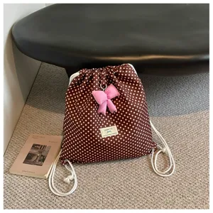 Sac à dos à cordon à pois marron avec joli nœud rose, sac d'école décontracté pour femme