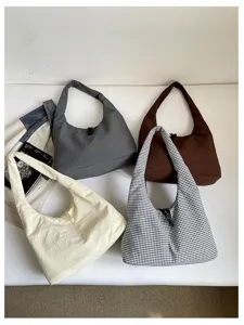 Casual large capacity shoulder bag detail view, multi-color hobo handbag for women commuting.