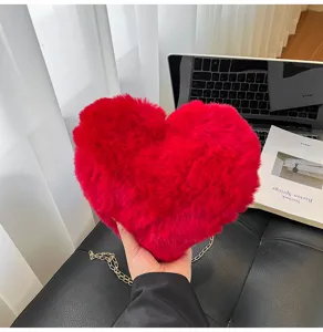 Fashion red plush heart-shaped crossbody bag with gold chain for women, cute winter shoulder purse.