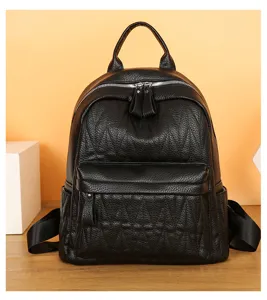 Black leather casual backpack detail view, large capacity school bag for daily use.