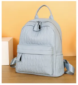 Light blue leather backpack casual school bookbag with quilted chevron pattern for daily use.