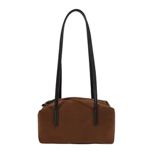 Sac à épaule en daim marron avec anses noires, fourre-tout rétro minimaliste pour femme active.
