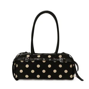 Stylish polka dot baguette shoulder bag for women, trendy casual daily underarm purse.