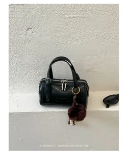 Sac Boston noir élégant pour femme, grande capacité sac à main et bandoulière décontracté.