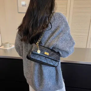 Women black quilted chain shoulder bag, classic flap underarm bag for daily commute, trendy.
