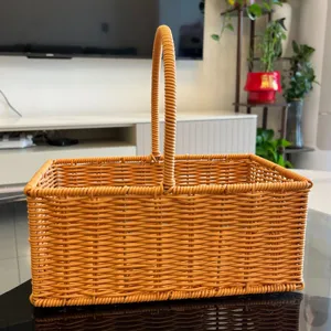 Brown woven rattan storage basket, square flower basket with handle for home decor.