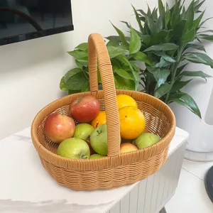 Close-up detail of imitation rattan woven fruit basket, sturdy handle for home storage.