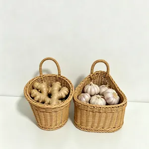 Detail view of wall-hanging woven storage baskets in kitchen, holding fresh ginger and garlic.