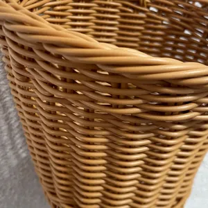 Close-up view of the fine woven texture and rim detail of the storage basket, smooth and durable.
