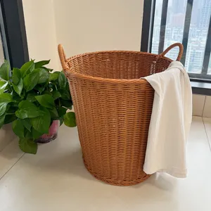 Large imitation rattan laundry basket, woven storage hamper with handles for home organization.