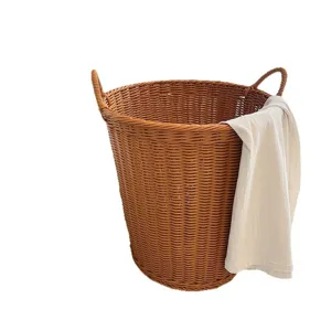 Large imitation rattan laundry basket with handles, durable woven storage hamper.