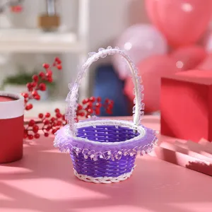 Purple and white woven flower basket with lace trim, perfect for wedding flower girl details.