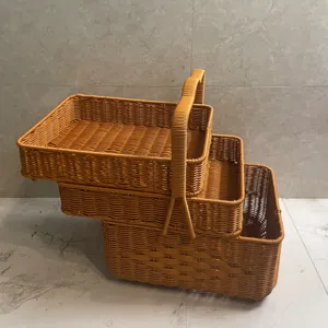 Detailed close-up view of the 3-layer woven picnic storage basket with convenient handle.