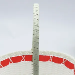 Handmade white woven flower basket with red ribbon and handle for home decor or gift packaging