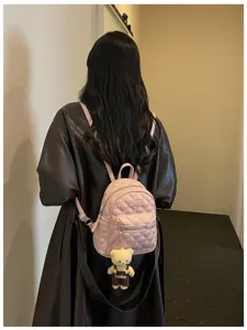 Élégant mini sac à dos matelassé rose pour femme, sac de voyage décontracté en cuir PU quotidien.