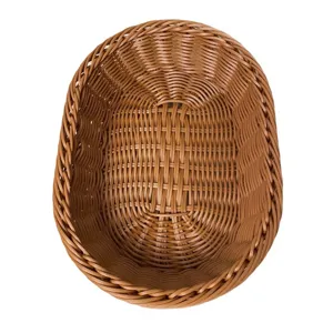 Imitation rattan woven storage basket for fruit, snacks, and desktop organization.