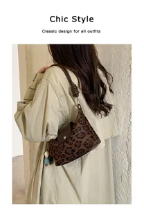 Detail shot of the vintage leopard print shoulder bag with stylish knot strap and flap design.