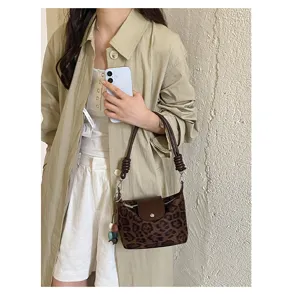 Korean vintage leopard print shoulder bag for women, stylish suede crossbody bag casual daily.