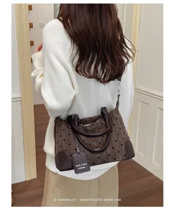 Sac à bandoulière rétro pour femme, fourre-tout élégant avec motif pois et design chic.