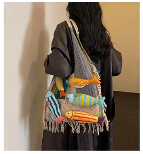 Knit tote bag for women featuring cute 3D fish decorations and stylish fringe design.