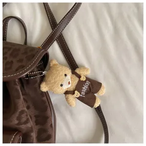 Brown leopard print mini backpack with cute plush bear pendant, stylish casual design detail