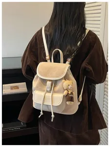 Korean casual backpack for women, stylish niche design PU leather school bag with cute bear.