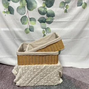Detailed shot of handmade woven storage baskets with fabric liners, stackable design for home.
