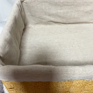 Handmade rectangular imitation rattan storage basket detail view with soft fabric inner lining.