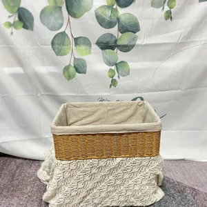 Handmade rectangular imitation rattan storage basket with lace trim for home organization.