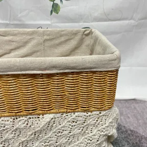 Detailed view of woven storage basket with fabric lining and rattan texture for home decor.