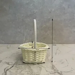 Detail view of the mini white woven basket, showing precise dimensions and fine texture.