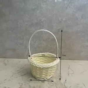 Mini woven imitation rattan flower basket desktop storage ornament with handle for home decor.