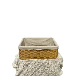 Handmade rectangular imitation rattan storage basket with fabric liner for home organization.