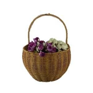Woven rattan storage basket with handle, imitation vine flower arrangement basket for home decor.