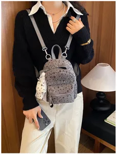 Mini sac à dos mignon motif étoile pour femme, sac décontracté en velours côtelé gris.