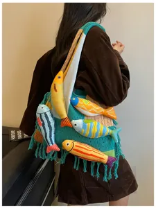 Casual knit tote bag for women featuring cute 3D plush fish pendants, stylish and unique daily use.