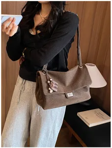 Borsa a tracolla in pelle intrecciata marrone da donna, elegante shopper capiente con chiusura.