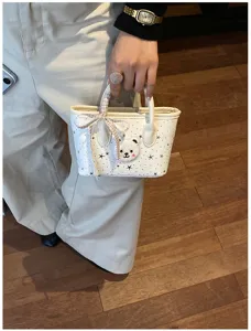 Women mini tote bag with cute bear patch and star print, stylish casual handbag for daily use.