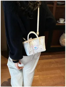 Chic white crossbody bag featuring cute bear patch and star pattern for women daily use.