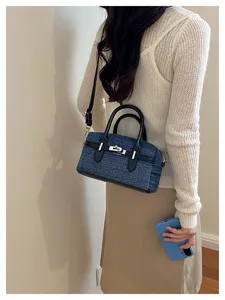 Retro denim handbag for women, large capacity shoulder and crossbody bag, stylish daily tote.