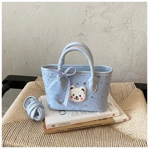 Cute light blue tote bag with cute bear patch, star pattern and bow, perfect for daily use.