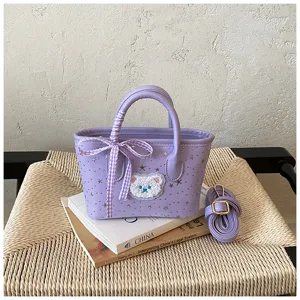 Stylish light purple handbag with star studs, plaid ribbon, and cute bear patch daily use.