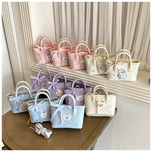 Cute mini handbag set with bear patch and bow, detail view showing lovely colors for daily use.