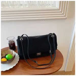 Borsa a tracolla nera intrecciata elegante da donna, borsa a spalla chic e casual alla moda.