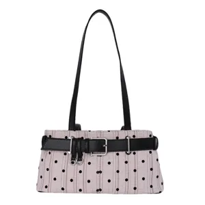 Vintage schoudertas met polkadots en stijlvolle rigesp, chique onderarmtas voor dames.