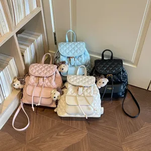 Classic quilted vintage backpack casual commuter travel book bag with cute bear charm.