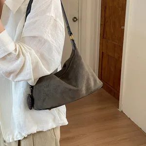 Fashion suede shoulder bag for women, trendy underarm daily casual bag showcasing front view.