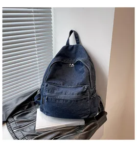 Vintage grote capaciteit denim rugzak, casual schoolboekentas voor dames en dagelijks gebruik.