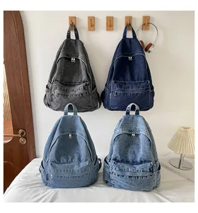Vintage denim rugzak met grote capaciteit voor dames, casual schooltas met vele zakken.